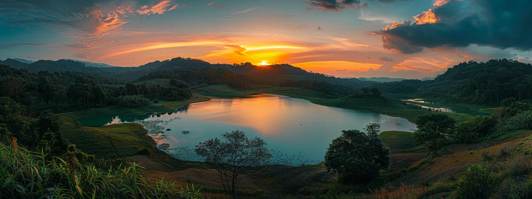 a vibrant sunset casts a warm golden hue over a tranquil lake, reflecting the colorful sky and surrounded by lush green mountains, creating a serene and picturesque landscape.