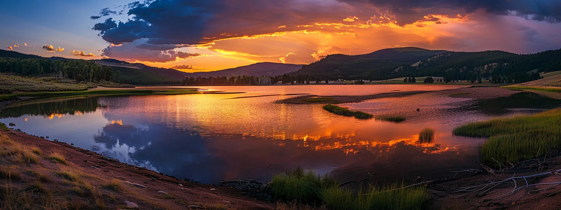 a vibrant sunset casts golden rays over a serene lake surrounded by towering, lush mountains, reflecting the breathtaking hues of the sky on the water's tranquil surface.